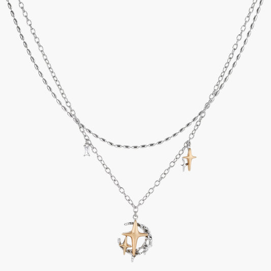 Layered silver-tone necklace set featuring star charms and crescent moon pendant with eco-friendly zinc alloy construction