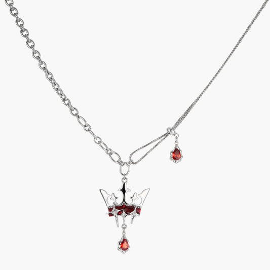 Eco-brass crown pendant necklace with red enamel details and dangling zirconia stone on chunky adjustable chain