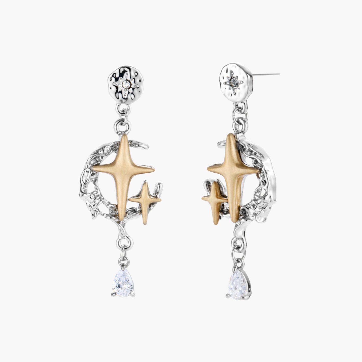 Two-tone star earrings with gold celestial motifs, silver chains, and clear crystal droplets on white background.