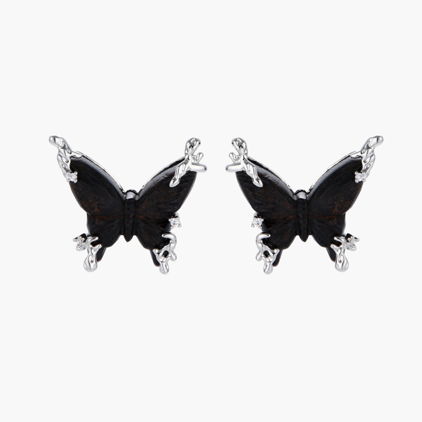 Wooden butterfly earrings with silver chain details in light and dark wood variants on white background