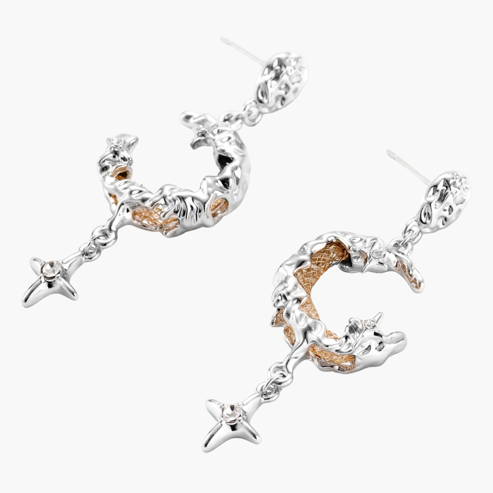 Mixed-metal jewelry set featuring layered necklaces with crescent moon pendant and pearl beads, plus matching star-drop earrings.