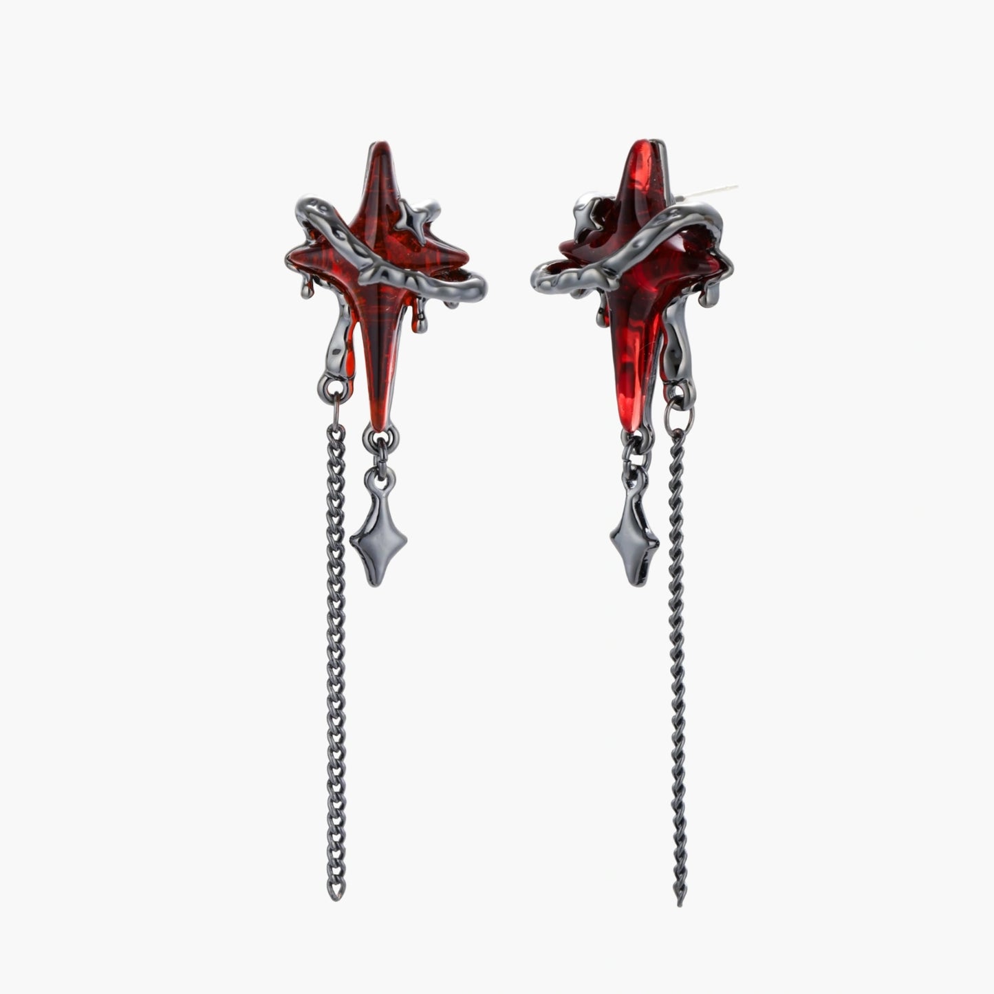 Gothic red resin dagger earrings with silver chain details and S925 posts on white background