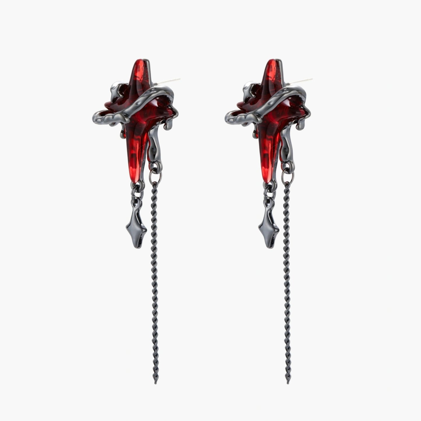 Gothic red resin dagger earrings with silver chain details and S925 posts on white background