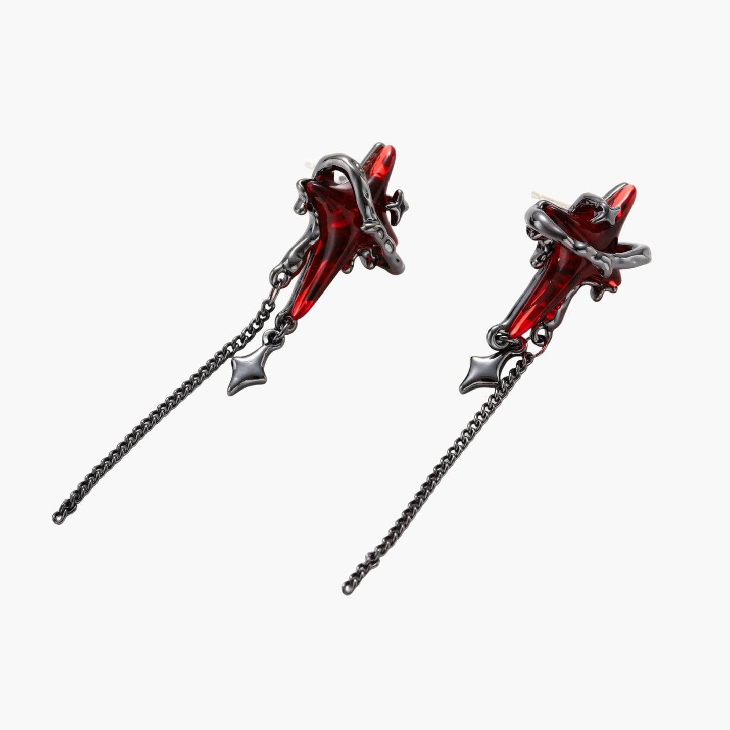 Gothic red resin dagger earrings with silver chain details and S925 posts on white background